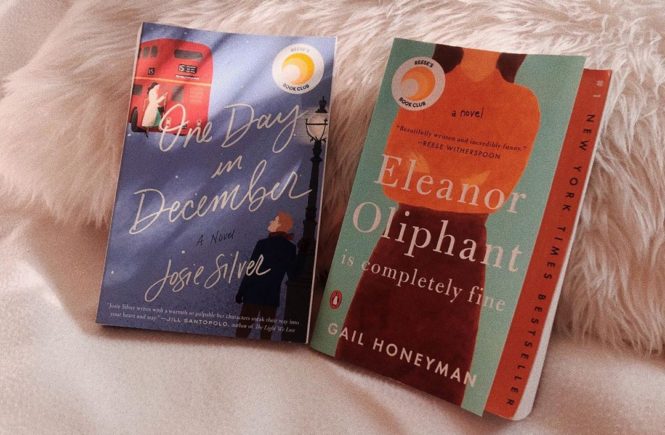 Two books: One Day in December by Josie Silver and Eleanor Oliphant is Completely Fine by Gail Honeyman with Reese's Book Club stickers in Palo Alto, California.