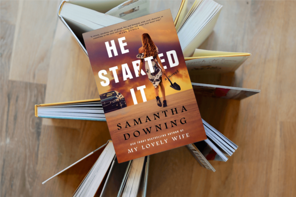 Thriller book He Started It by Samantha Downing on top of a pile of other bestselling thriller books.